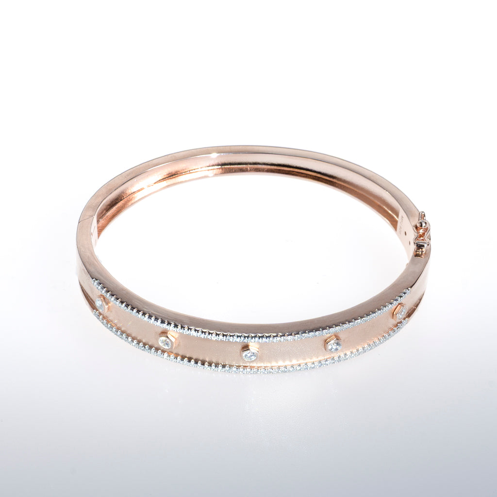 Rose Gold Bracelet with Clear CZ Crystals Lined on Edge of Both Sides and Down Middle