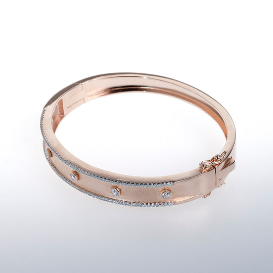 Rose Gold Bracelet with Clear CZ Crystals Lined on Edge of Both Sides and Down Middle
