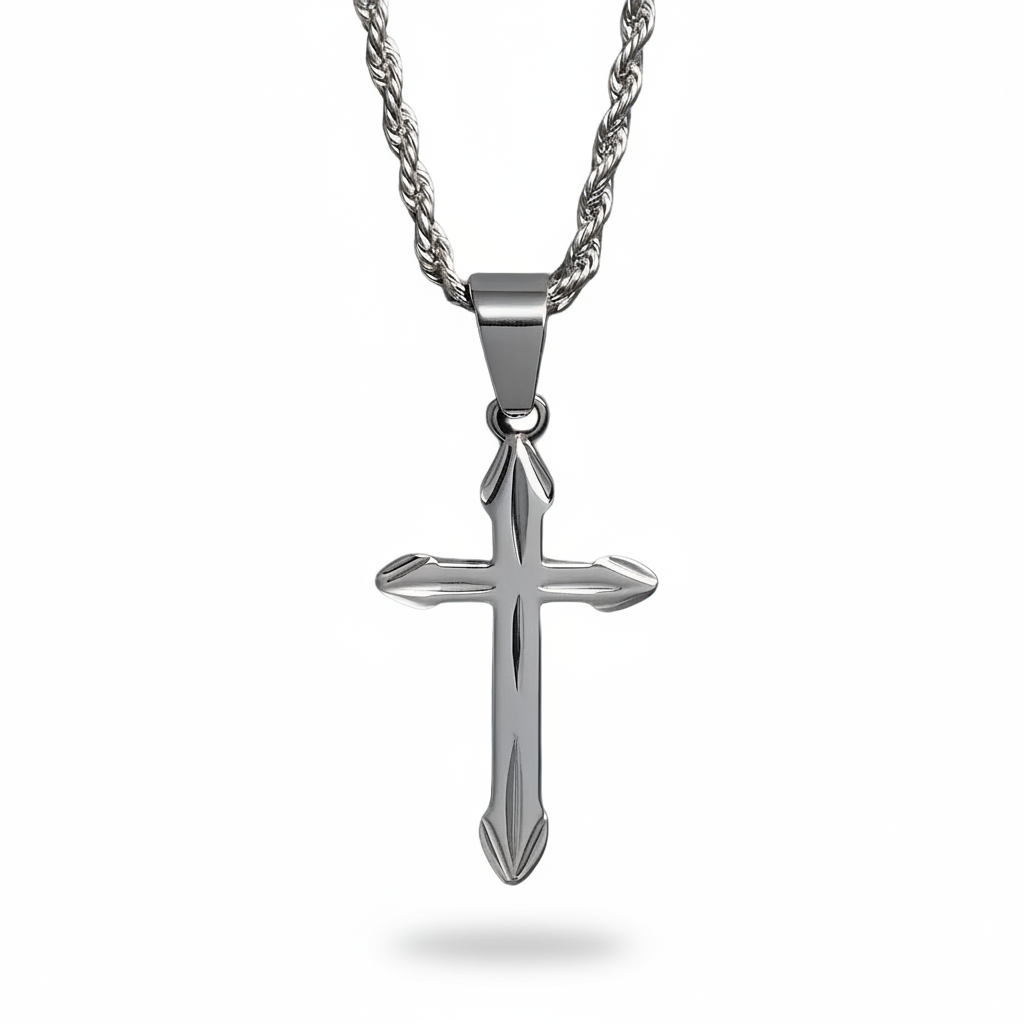 Silver decorative cross pendant necklace on white background