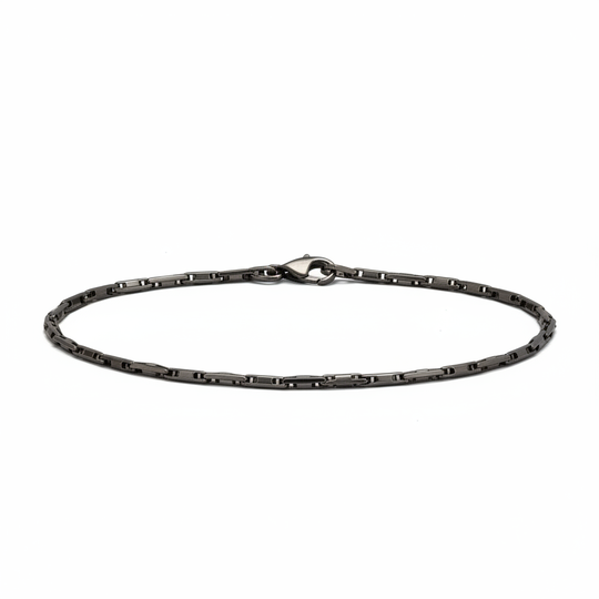 Men's oxidized sterling silver chain bracelet on white background
