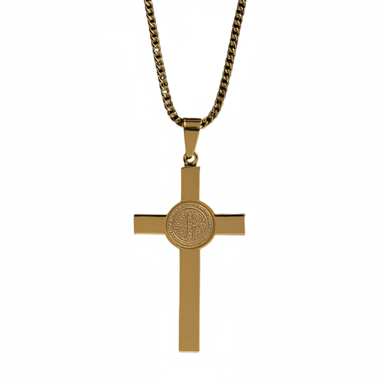 Gold St. Benedict cross necklace on white background