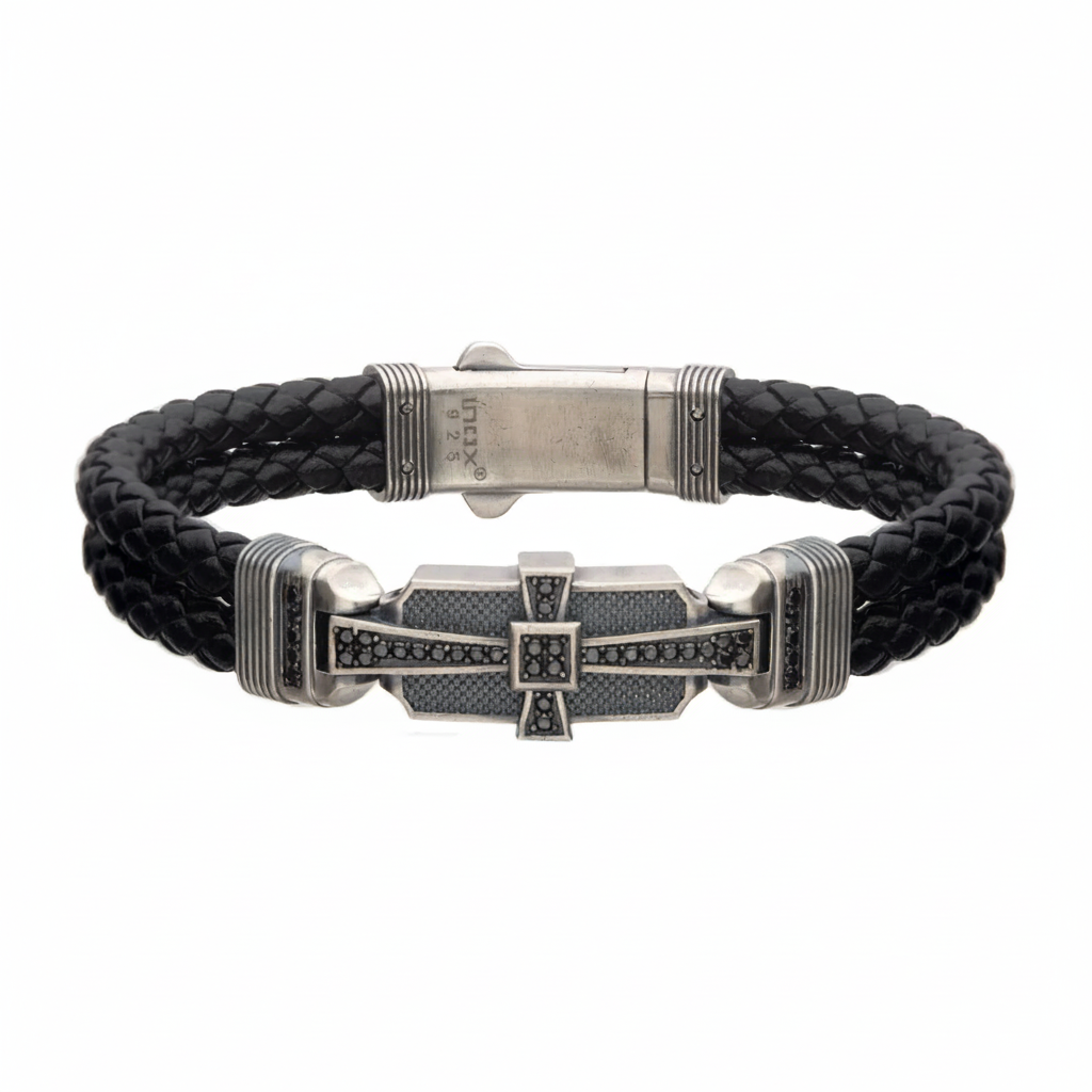 Double braid black leather bracelet with sterling silver cross on light gray background