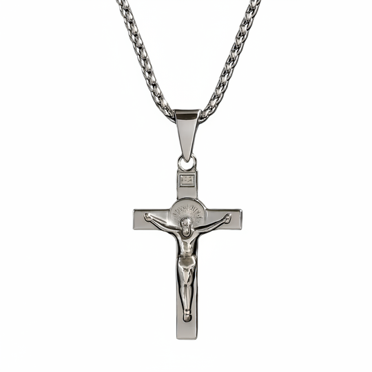 Stainless steel crucifix pendant necklace on white background
