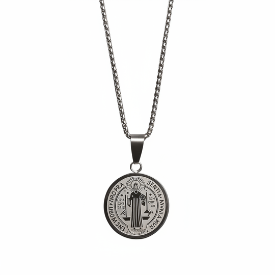 Silver St. Benedict medal necklace on white background