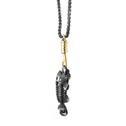 Men's Black Plated Fishbone Pendant on a Polished Gold Plated Hook